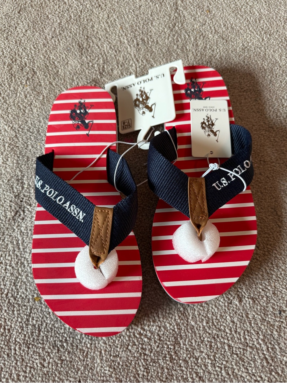 U.S. Polo Assn. Red and White Striped Flip Flops with Navy Logo Straps